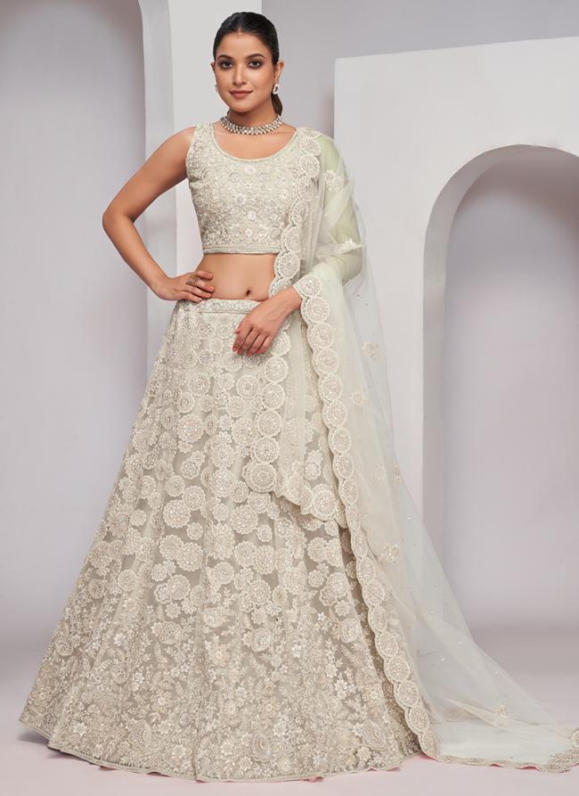 Soft Net Ivory Wedding Wear Sequins Work Lehenga Choli